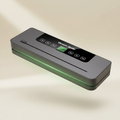 PactFresh handheld vacuum sealer on kitchen counter with sealed food bags